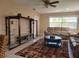 Comfortable living room with neutral walls, ceiling fan, and modern furnishings at 10039 62Nd N Ave # 14, St Petersburg, FL 33708