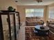 Inviting living room with comfortable leather seating and tile floors at 10039 62Nd N Ave # 14, St Petersburg, FL 33708