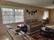 Cozy living room with plush furniture, window views, and decor at 10039 62Nd N Ave # 14, St Petersburg, FL 33708