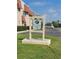 Community signage at the entrance of Long Bayou building 8 on a sunny day at 10039 62Nd N Ave # 14, St Petersburg, FL 33708