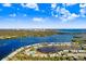 Breathtaking aerial view of the condo community on the water, with lush greenery and amazing water access at 113 Seahorse Se Dr # D, St Petersburg, FL 33705