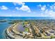 Expansive aerial view of the waterfront community, showing the beautiful coastline and tranquil lake at 113 Seahorse Se Dr # D, St Petersburg, FL 33705