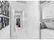Hallway includes washer and dryer and decor on the wall at 113 Seahorse Se Dr # D, St Petersburg, FL 33705