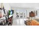 Bright living room with tile floors, abundant natural light, and serene views of the nearby pond at 113 Seahorse Se Dr # D, St Petersburg, FL 33705
