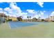 Well-maintained tennis courts with blue and green surfaces, offering residents a great recreational amenity at 113 Seahorse Se Dr # D, St Petersburg, FL 33705