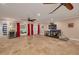 Expansive open living area featuring tile flooring, recessed lighting, and glass patio doors at 11434 Minnieola Dr, New Port Richey, FL 34654