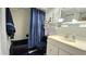 Bathroom featuring a bathtub, shower, toilet and vanity with nautical decor at 1301 S Hercules Ave # 3, Clearwater, FL 33764