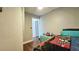 bedroom featuring wood floors and closet at 1301 S Hercules Ave # 3, Clearwater, FL 33764