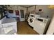 Functional laundry room with multiple washers and dryers at 1301 S Hercules Ave # 3, Clearwater, FL 33764