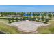 The community playground features shade cover, swings, and climbing structures at 13549 Willow Bluestar Loop, Riverview, FL 33579