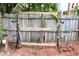 Backyard featuring a wooden kayak rack against a wooden fence, great for storing kayaks at 1519 Delaware Ne Ave, St Petersburg, FL 33703