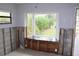 Kitchen area features a window overlooking garden, enhancing the space with natural light at 1519 Delaware Ne Ave, St Petersburg, FL 33703