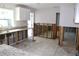 Spacious kitchen showcases granite countertops, white cabinets, and modern stainless sink at 1519 Delaware Ne Ave, St Petersburg, FL 33703