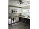 Kitchen features a stainless microwave, ample cabinet space, and granite countertops at 1519 Delaware Ne Ave, St Petersburg, FL 33703