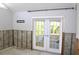 This living room features French doors that allow a lot of natural light at 1519 Delaware Ne Ave, St Petersburg, FL 33703