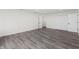 Large bedroom features wood flooring and walk-in closet at 16417 Lake Byrd Dr, Tampa, FL 33618