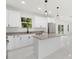 Modern kitchen with stainless steel appliances, granite countertops, and center island at 16417 Lake Byrd Dr, Tampa, FL 33618