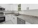 Well-designed kitchen featuring granite countertops and stainless steel appliances at 16417 Lake Byrd Dr, Tampa, FL 33618