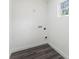 A laundry room with utility hookups and flooring at 16417 Lake Byrd Dr, Tampa, FL 33618