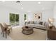 Comfortable living room with neutral colors, plush seating, and a view of the outdoor landscape at 16417 Lake Byrd Dr, Tampa, FL 33618
