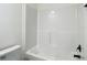 Bathroom with an all-white bathtub and a black shower head at 18079 Carrolwood Dr, Brooksville, FL 34604