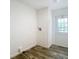 This room features wood-look floors and access to an exterior door at 18079 Carrolwood Dr, Brooksville, FL 34604