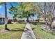 Serene community featuring lush green spaces and manicured lawns at 1902 Dandridge St # 6, Sun City Center, FL 33573