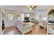 Inviting living room with a cozy seating area, a large window, and an open layout at 1902 Dandridge St # 6, Sun City Center, FL 33573