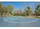 Outdoor basketball court with painted lines, great for sports and recreation at 1996 Promenade Way, Clearwater, FL 33760