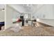 Kitchen with granite countertops and stainless steel appliances provides ample space for meal preparation at 1996 Promenade Way, Clearwater, FL 33760