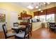 Cozy coffee bar area with kitchenette, round table and chairs, plus comfortable seating at 221 Shell Falls Dr, Apollo Beach, FL 33572