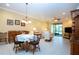 Open living space with a dining table and comfortable seating at 221 Shell Falls Dr, Apollo Beach, FL 33572