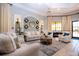 Elegant lobby area featuring comfortable seating, neutral tones, and an abundance of natural light at 221 Shell Falls Dr, Apollo Beach, FL 33572