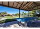 Outdoor ping pong table with a view of the lawn and community buildings at 221 Shell Falls Dr, Apollo Beach, FL 33572