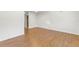 Spacious living room with hardwood flooring and white walls at 250 Nw Rosery Rd # 314, Largo, FL 33770