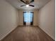 Comfortable bedroom with carpet, ceiling fan, and natural light at 3267 Pleasant Willow Ct, Brandon, FL 33511