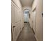 Hallway features tile flooring and an arched doorway at 3267 Pleasant Willow Ct, Brandon, FL 33511