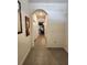 Inviting hallway with neutral tile flooring, leading to other areas of the home at 3267 Pleasant Willow Ct, Brandon, FL 33511