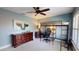 bedroom featuring a loft bed, ladder, and a desk with a chair at 3639 Darston St, Palm Harbor, FL 34685