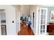 Inviting foyer with hardwood floors, leading to a spacious living area at 3639 Darston St, Palm Harbor, FL 34685
