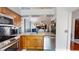 Spacious kitchen with stainless steel appliances and a dishwasher at 3639 Darston St, Palm Harbor, FL 34685