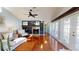 Bright living room with hardwood floors, fireplace and lots of natural light at 3639 Darston St, Palm Harbor, FL 34685