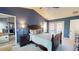 Primary bedroom featuring private access to the pool, ensuite bathroom, and vaulted ceilings at 3639 Darston St, Palm Harbor, FL 34685