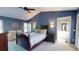 Serene main bedroom with a vaulted ceiling, ensuite bathroom, and plush carpeting at 3639 Darston St, Palm Harbor, FL 34685