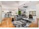 Open-concept living room seamlessly connects to the kitchen, perfect for entertaining at 401 Apache Trl, Brandon, FL 33511