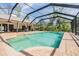 Screened-in pool and patio area, perfect for entertaining or relaxing outdoors year-round at 401 Apache Trl, Brandon, FL 33511