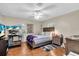 Serene bedroom with wood floors, a large window, and ample closet space at 427 5Th Nw St, Largo, FL 33770