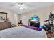 Bedroom with lots of natural light, neutral paint, and wood-look flooring at 427 5Th Nw St, Largo, FL 33770