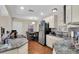 Bright kitchen featuring granite countertops, stainless appliances and ample counter space at 427 5Th Nw St, Largo, FL 33770