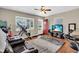 Cozy living room featuring lots of natural light and wood-look flooring at 427 5Th Nw St, Largo, FL 33770